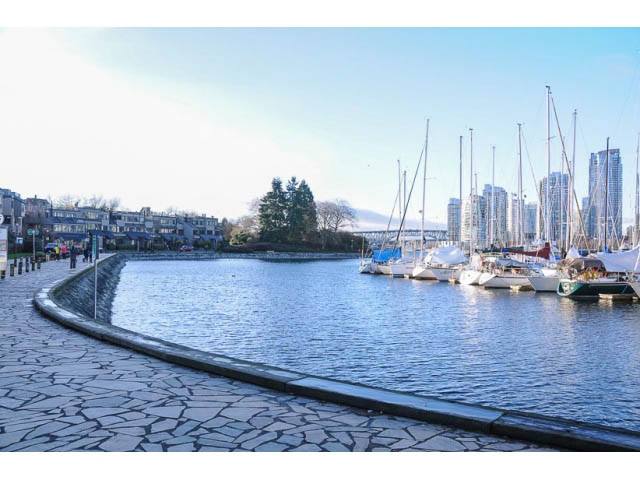 Furnished living room with city view and harbor scene. - 654 Millbank, Vancouver West Side
