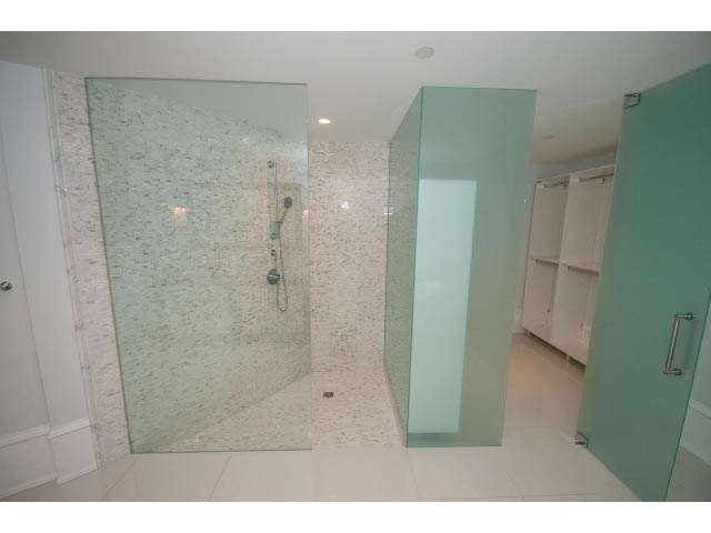 Spacious bathroom with glass shower and mosaic tile walls. - 403 - 1102 Hornby St
403 - 1102 Hornby Street, Vancouver Downtown