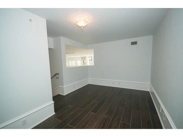 Bright living room with hardwood floors and a chandelier. - 403 - 1102 Hornby St
403 - 1102 Hornby Street, Vancouver Downtown