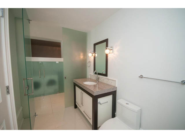 Bright bathroom with white walls, glass shower, and modern sink. - 403 - 1102 Hornby St
403 - 1102 Hornby Street, Vancouver Downtown