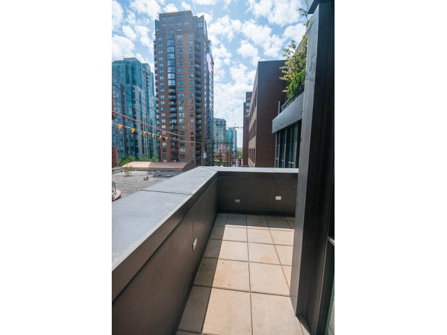 Spacious balcony with city view and modern furnishings. - 403 - 1102 Hornby St
403 - 1102 Hornby Street, Vancouver Downtown