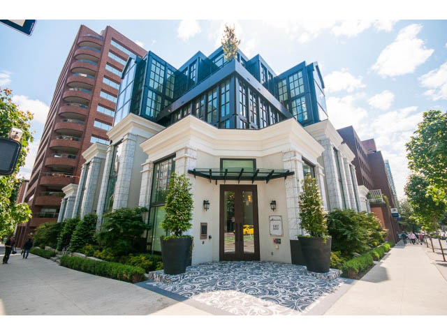 Furnished 2-bedroom + den condo with modern design, large windows, and city views.