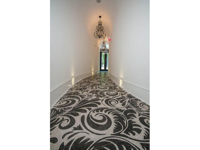 Foyer with ornate black and white patterned floor, chandelier, and white walls. - 403 - 1102 Hornby St
403 - 1102 Hornby Street, Vancouver Downtown