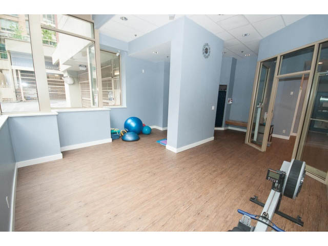 Bright living room with hardwood floors and city view. - 1404 - 819 Hamilton Street, Vancouver Downtown