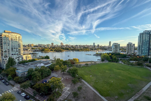 A wide view of David Lam Park's lawn and playground running down to False Creek - 15B-199 Drake Street, Vancouver Downtown
