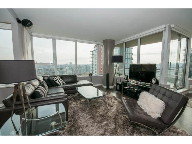 Furnished living room with city view and modern decor. - 2203 - 33 Smithe Mews, Vancouver Downtown