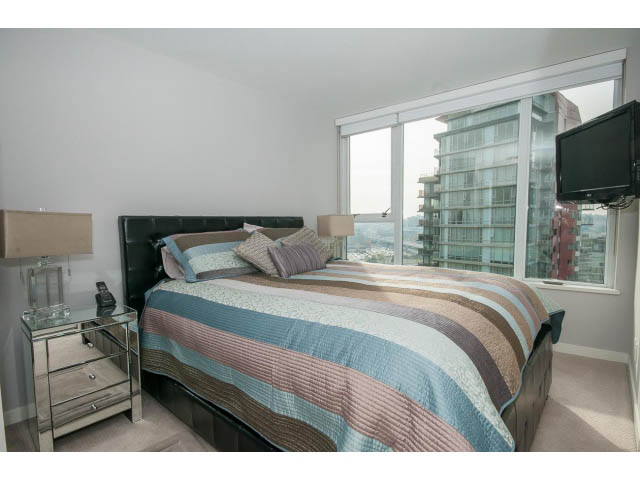 Bright bedroom with city view and modern furnishings. - 2203 - 33 Smithe Mews, Vancouver Downtown