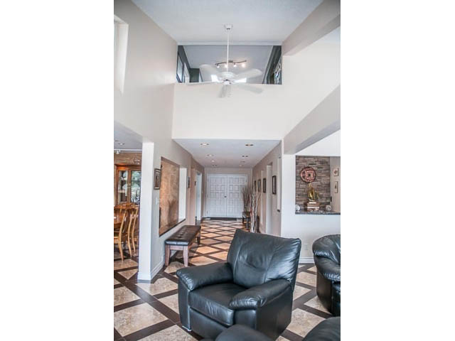 Spacious living room with modern furniture, open floor plan, and stylish decor. - 4541 Strathcona Road, North Vancouver