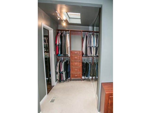 Spacious walk-in closet with ample hanging space and drawers. - 4541 Strathcona Road, North Vancouver
