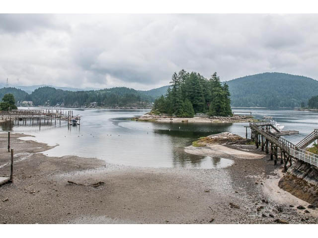 Furnished living room with a view of the lake and forest. - 4541 Strathcona Road, North Vancouver