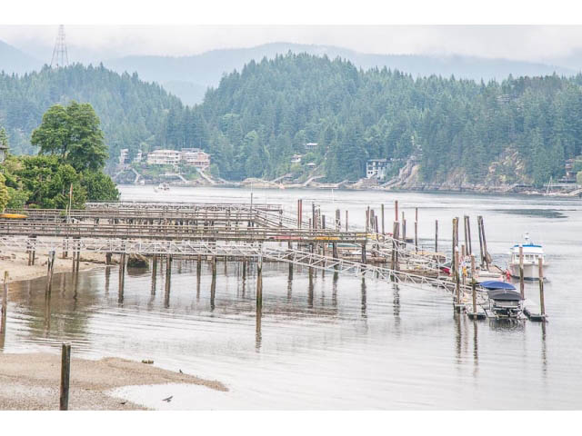 Furnished 4-bedroom + den house with a serene waterfront view and dock access. - 4541 Strathcona Road, North Vancouver