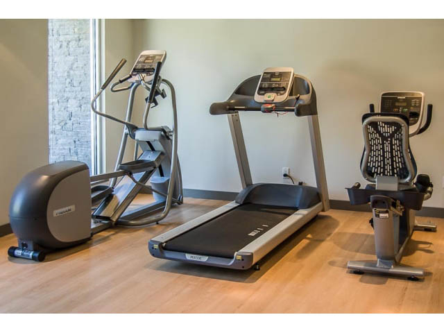 Bright gym with hardwood floors and cardio machines. - 501 - 221 East 3rd Street, North Vancouver