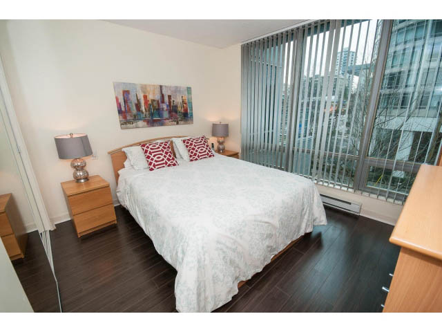Furnished 1-bedroom with hardwood floors, city view, and modern decor. - 507 - 1200 West Georgia Street, Vancouver Downtown