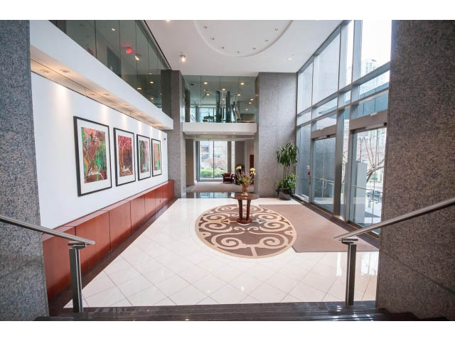 Furnished living room with modern decor and large windows. - 507 - 1200 West Georgia Street, Vancouver Downtown