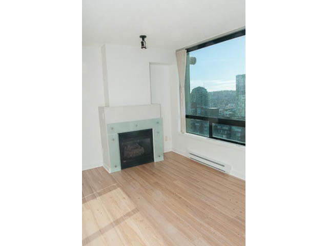 Bright living room with hardwood floors and a city view. - 1406 - 1003 Burnaby Street, Vancouver Downtown