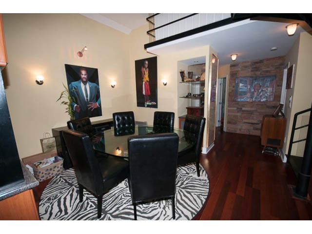 Furnished living room with hardwood floors and zebra print rug. - 705 - 1263 Barclay, Vancouver Downtown
