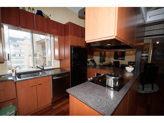 Bright kitchen with granite countertops, hardwood floors, and a city view. - 705 - 1263 Barclay, Vancouver Downtown