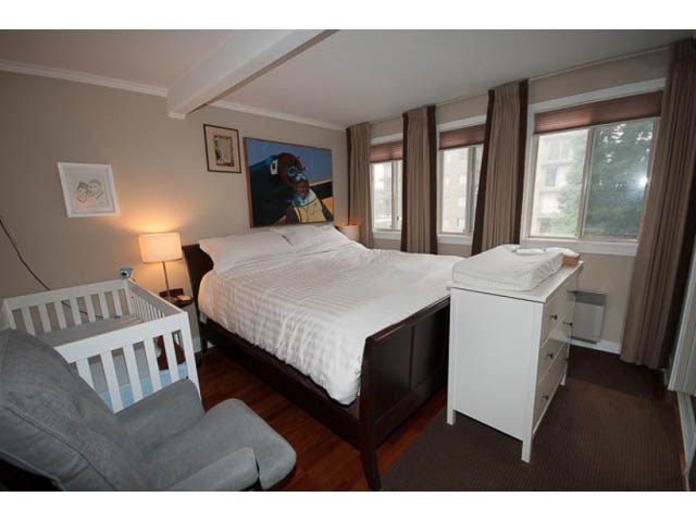 Bright bedroom with two single beds, hardwood floors, and large windows. - 705 - 1263 Barclay, Vancouver Downtown