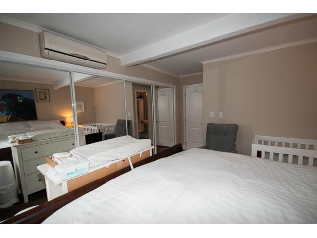 Bright bedroom with mirrored closet and hardwood floors. - 705 - 1263 Barclay, Vancouver Downtown