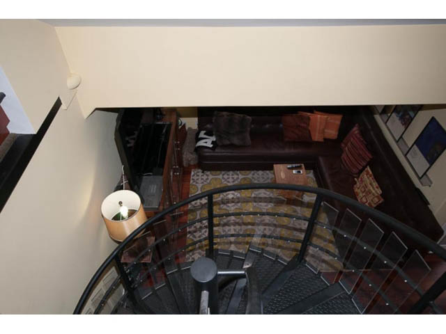Furnished penthouse with spiral staircase and cozy seating area. - 705 - 1263 Barclay, Vancouver Downtown