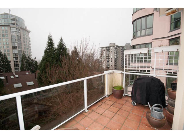 Furnished penthouse with tiled balcony, city view, and modern furnishings. - 705 - 1263 Barclay, Vancouver Downtown
