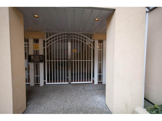 Furnished entryway with arched gate and light-colored walls. - 705 - 1263 Barclay, Vancouver Downtown