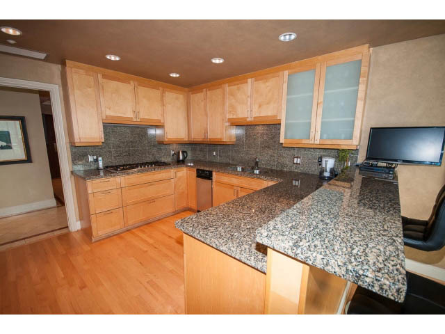 Bright kitchen with granite countertops, hardwood floors, and a modern design. - 1102 - 1777  Bayshore Drive, Vancouver Downtown