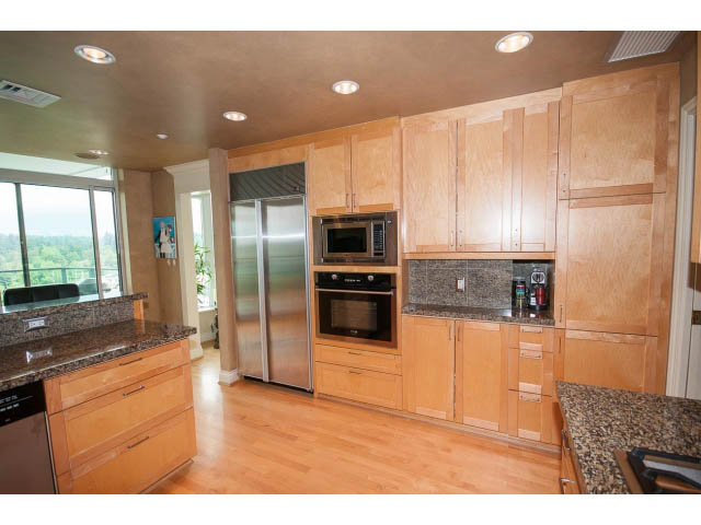 Bright kitchen with granite countertops, hardwood floors, and a city view. - 1102 - 1777  Bayshore Drive, Vancouver Downtown