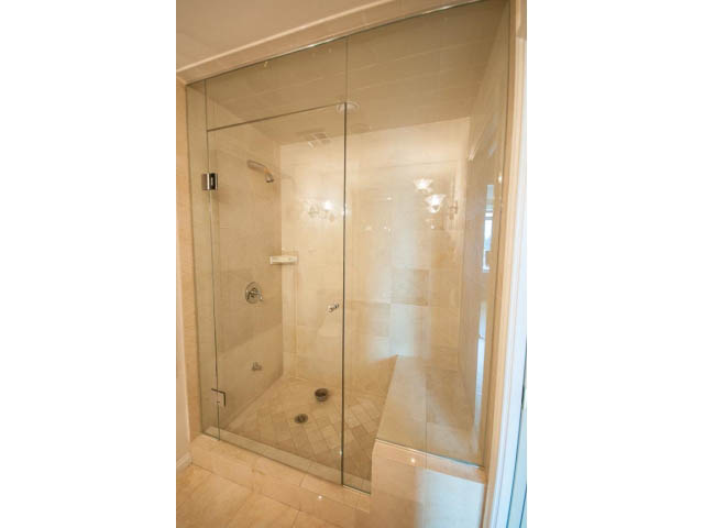 Furnished 2-bedroom + den with modern glass shower and beige tile walls. - 1102 - 1777  Bayshore Drive, Vancouver Downtown
