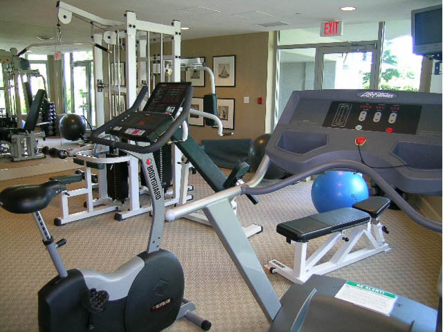Bright gym with cardio equipment and weight machines. - 1102 - 1777  Bayshore Drive, Vancouver Downtown