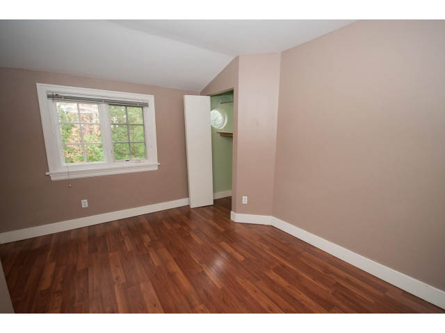Bright living room with hardwood floors and a window view. - 3407 West 34th Ave, Vancouver West Side