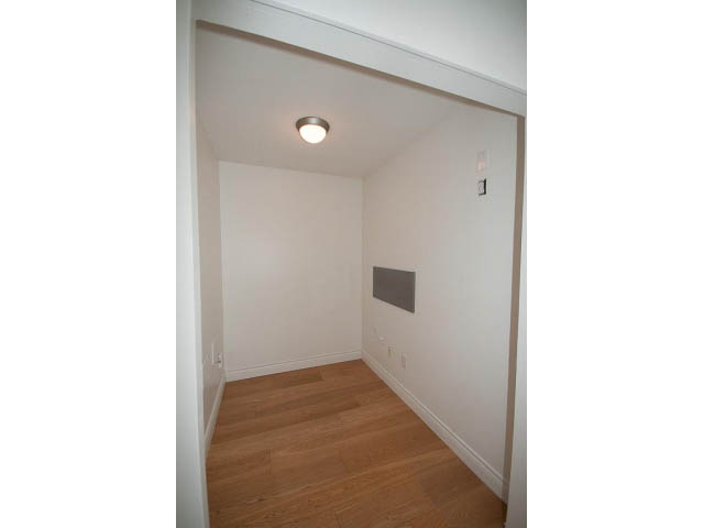 Den with hardwood floors and a recessed light fixture. - 409 - 3023 West 4th Ave., Vancouver West Side