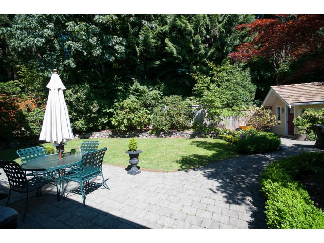 Furnished patio with outdoor furniture and lush greenery. - 3364 Redfern Pl., North Vancouver