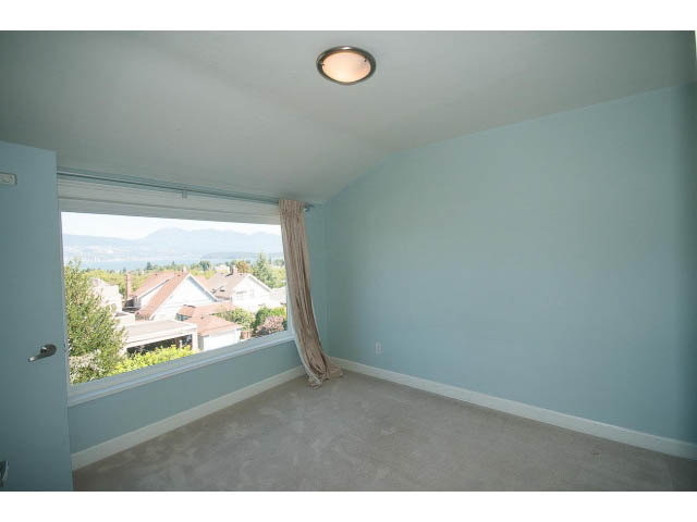 Den with carpet, city view, and recessed lighting. - 3939 West 11th Ave, Vancouver West Side