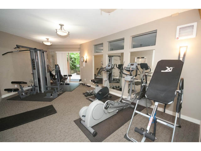 Spacious gym with cardio machines and weight equipment. - 312 - 1633 Mackay Avenue, North Vancouver