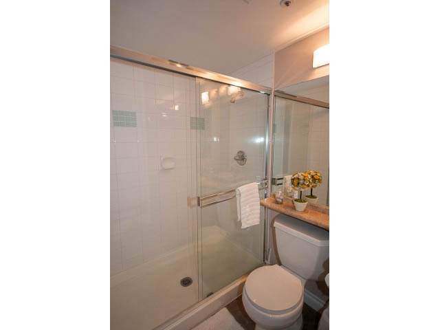 Furnished bathroom with glass shower and white fixtures. - 502 - 555 Jervis, Vancouver Downtown