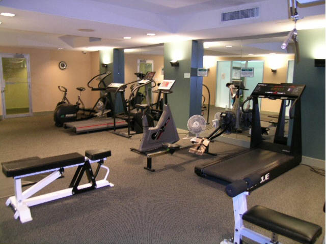Fitness room with cardio machines and weight benches. - 502 - 555 Jervis, Vancouver Downtown