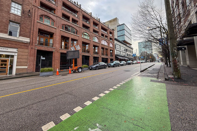Loft with modern furnishings and a view of the city street. - 308 - 546 Beatty Street, Vancouver Downtown