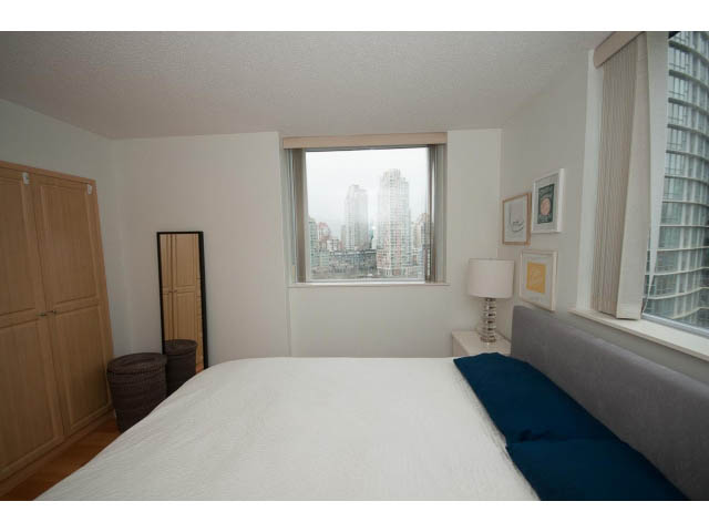 Furnished bedroom with city view and modern decor. - 2006 - 583 Beach Crescent, Vancouver Downtown