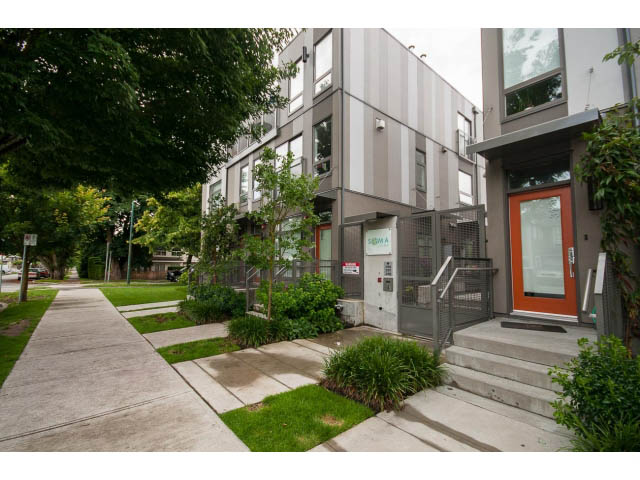 Furnished living room with modern decor and greenery. - 3187 St. George St., Vancouver East Side