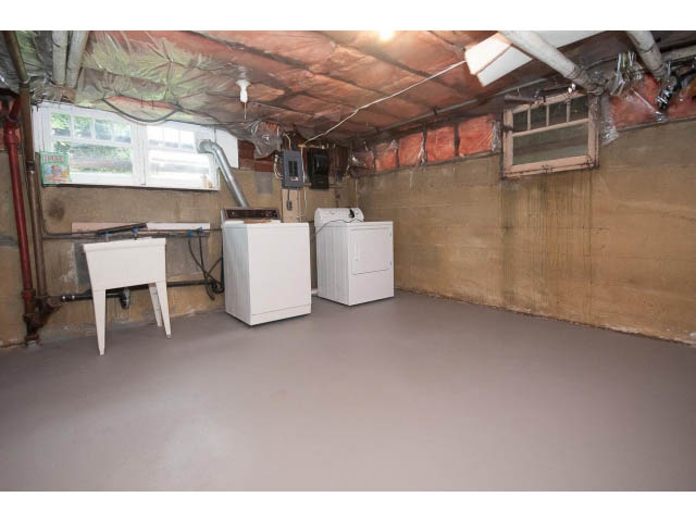 Laundry room with unfinished walls, exposed pipes, and a small window. - 5756 Angus Drive, Vancouver West Side