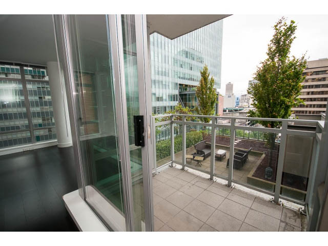 Bright and airy balcony with city view and modern furnishings. - 1106 - 788 Richards, Vancouver Downtown