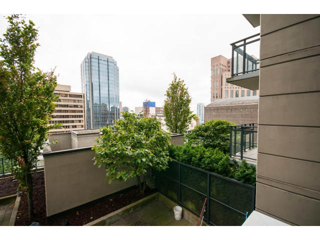 Furnished balcony with city view and greenery. - 1106 - 788 Richards, Vancouver Downtown