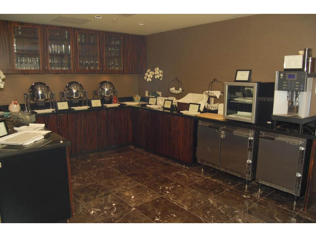 Furnished kitchen with granite countertops and espresso machine, modern design. - 1106 - 788 Richards, Vancouver Downtown