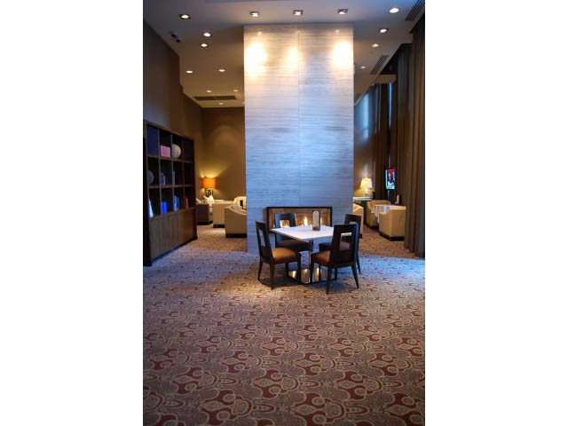 Furnished living room with patterned carpet and modern decor. - 1106 - 788 Richards, Vancouver Downtown