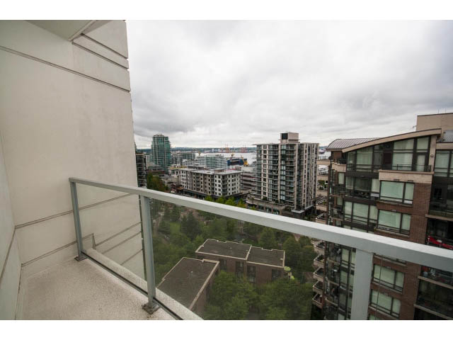 Bright balcony with city view and modern furnishings. - 1105 - 175 West 2nd Street, North Vancouver