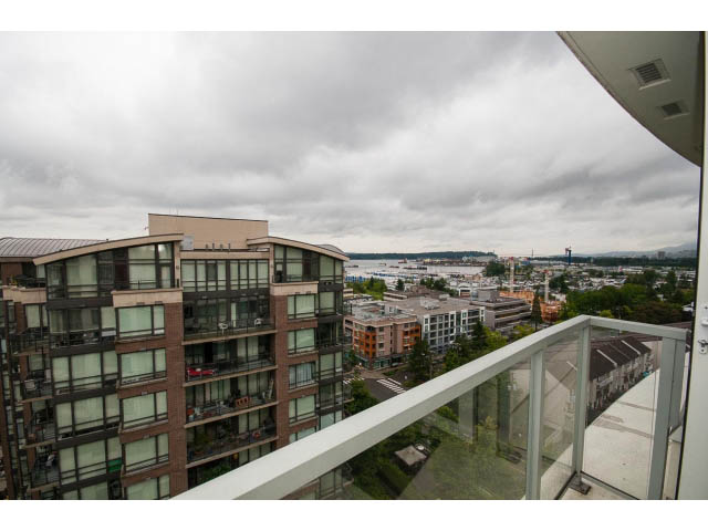 Bright balcony with city view and modern furnishings. - 1105 - 175 West 2nd Street, North Vancouver