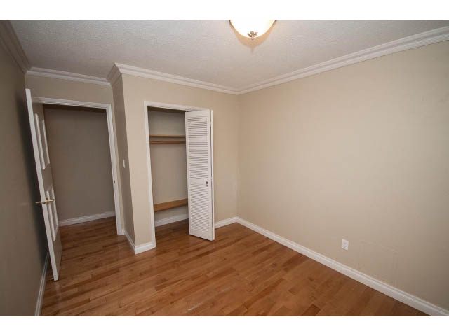 Bright den with hardwood floors and open closet. - Upper - 1998 Cortell St., North Vancouver