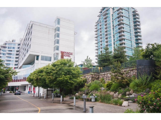 Furnished 1-bedroom condo with city views and modern furnishings. - 203 - 162 Victory Ship Way, North Vancouver