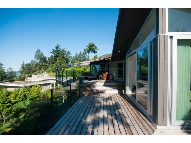 Bright deck with wooden flooring and stunning ocean view. - 6190 Candia Place, West Vancouver